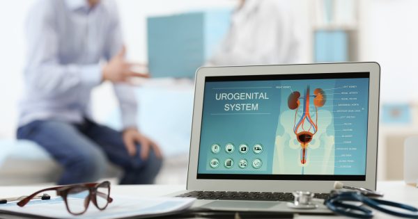 Medical concept. Laptop with urology image on doctor's desk